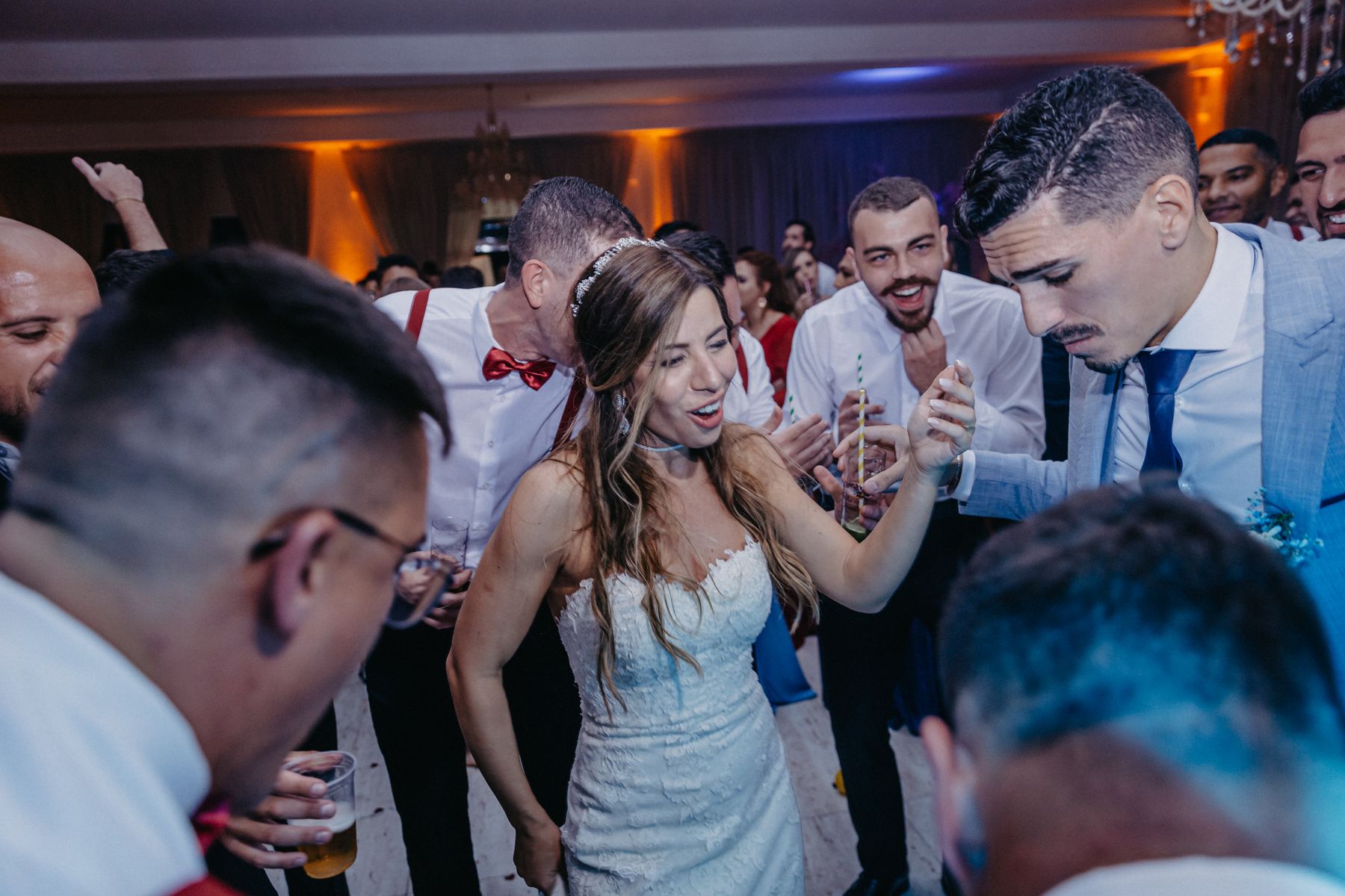 Wedding guests enjoying the reception together